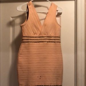 2 B Bebe dress size medium  small stain